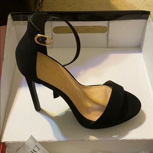 Black heels worn once for a few hours